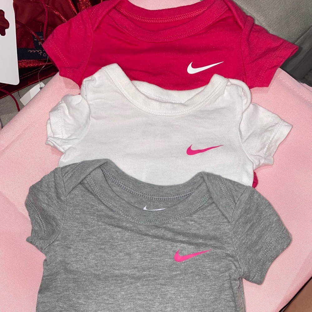 Newborn Nike onesies